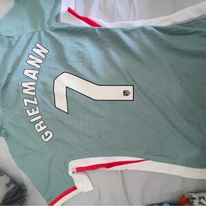 Nike Teal Soccer Jersey with Red and White Accents